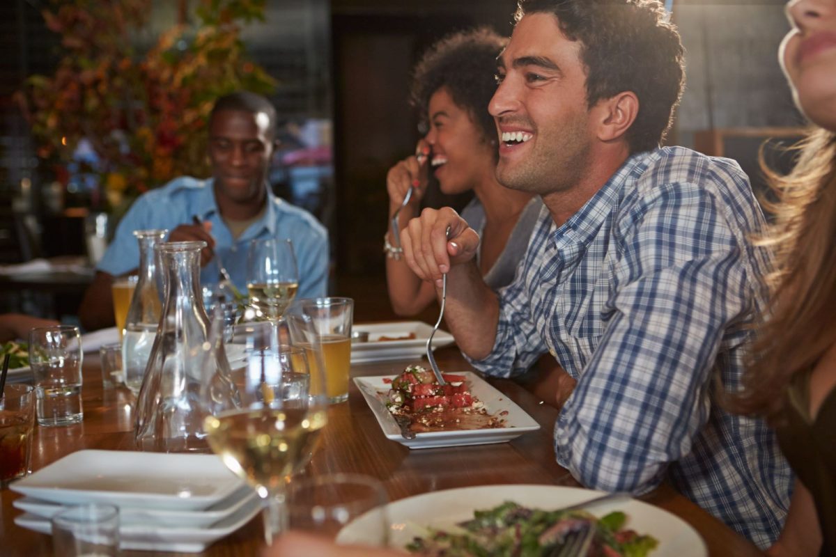 Group of people eating at Anna Maria Island restaurant