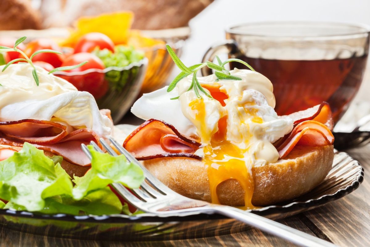 Eggs benedict sandwich and tea.