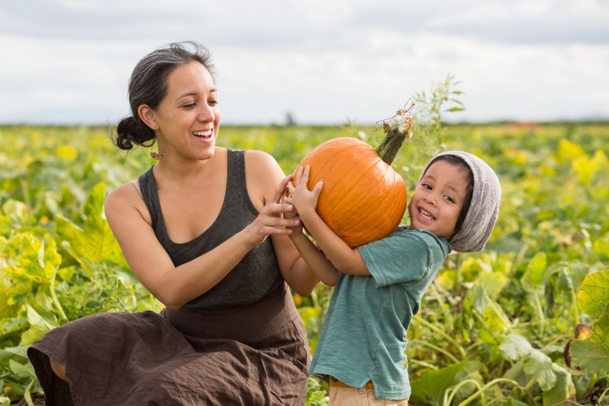 mother and child at pumpkin patch